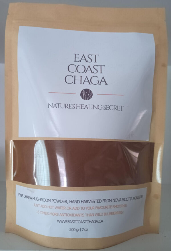 A 200 gram bag filled with dark, finely ground East Coast Chaga powder
